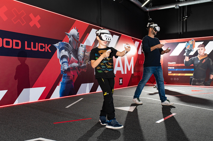 Friends enjoying a walk-in VR session